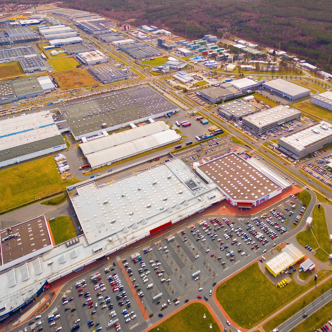 &lt;Aerial overhead view of a large dietary supplement manufacturing facility with various buildings, car parks and green areas. Credit&gt; AdobeStock_199347033