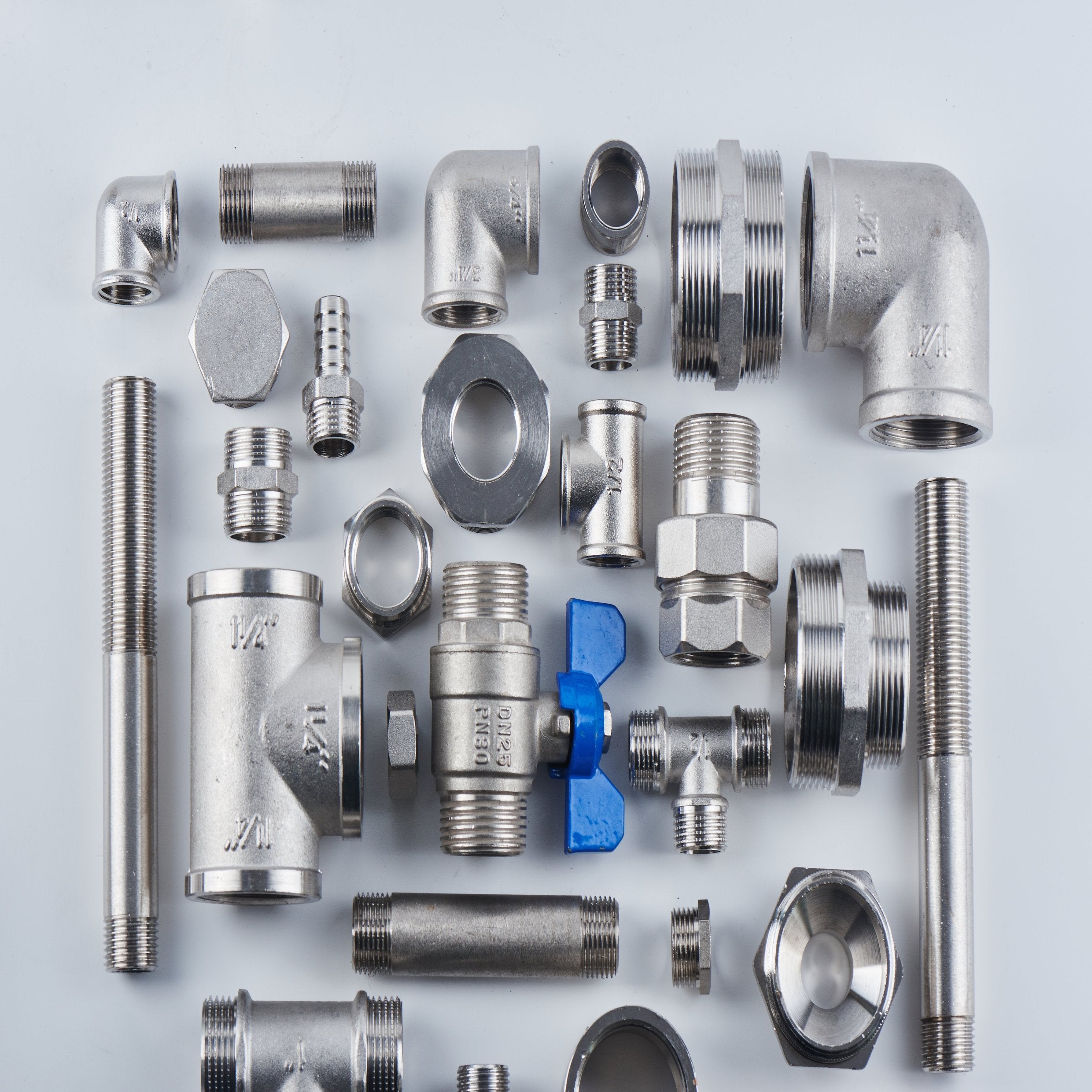 &lt;Various chrome and stainles steel parts from the plumbing and waste system laid out in a square including valves, screw threads and l-shaped pipework. Credit&gt; AdobeStock_218488774