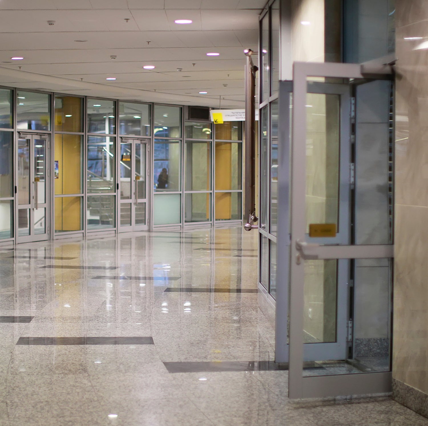 &lt;Polished marble floor and wall lobby of the entrance to a drug facility via glass doors. Credit&gt; AdobeStock_297383102