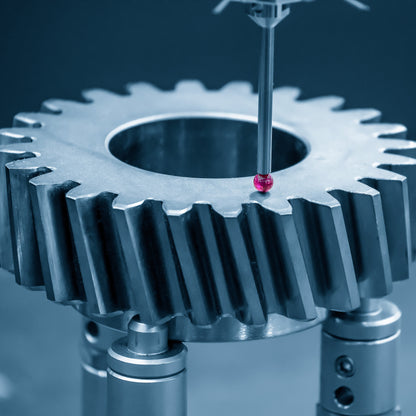 &lt;On a grey background, measuring with a touch sensor the brushed steel gear part, that resembles a cog from a 
 clock, taken from a filling machine for calibration and maintenance. Credit&gt; AdobeStock_370574811