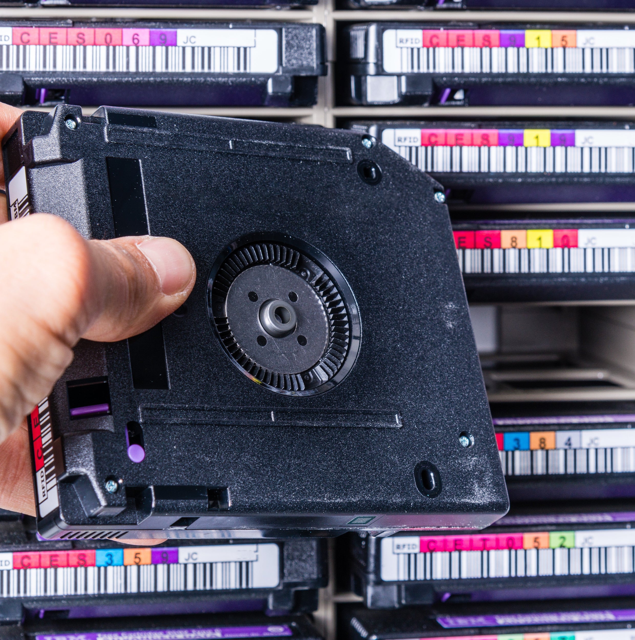 &lt;Old records on magnetic tape storage kept in boxes with barcode numbers. Credit&gt; AdobeStock_386856509