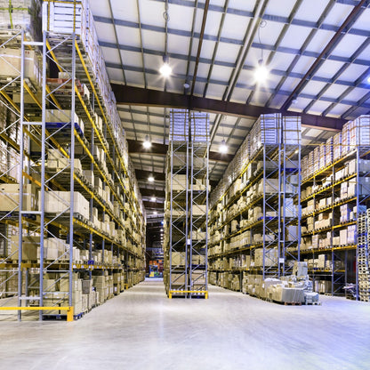 &lt;Large, clean, tidy warehouse with high racking storing outsourced customer drug product. Credit&gt; AdobeStock_51465184