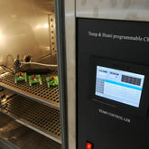 <Black and silver temperature and humidity controlled stability oven with digital display during a door open study with probes placed on the stainless steel shelves. Credit> 142294667©Audrius Merfeldas
| Dreamstime.com