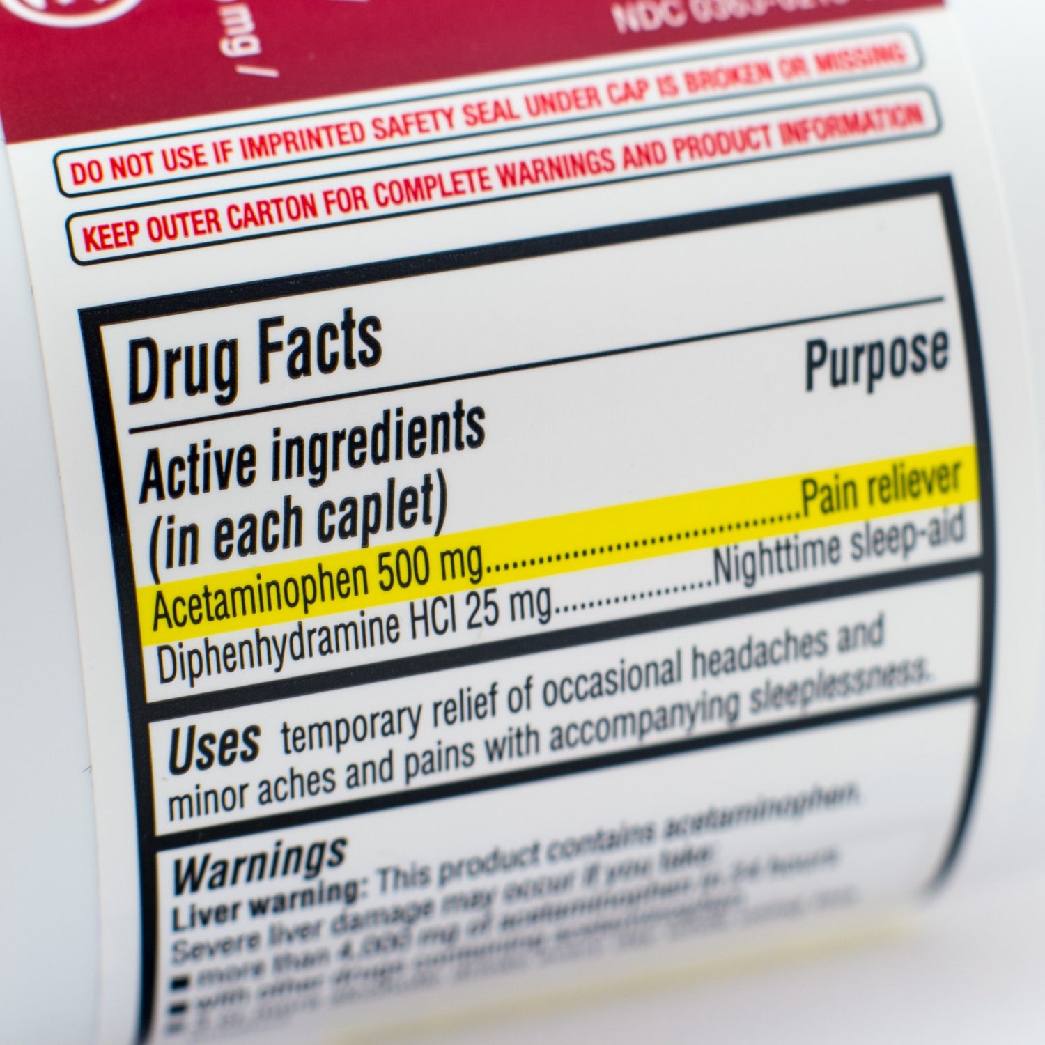 &lt;Drugs facts label on a white bottle being inspected for claims and active ingredeint Acetaminophen vresus production and laboratory records. Credit&gt; 53889861 © Kevin Giszewski | Dreamstime.com